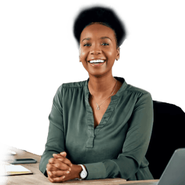African women sitting on a desk with a laptop 
